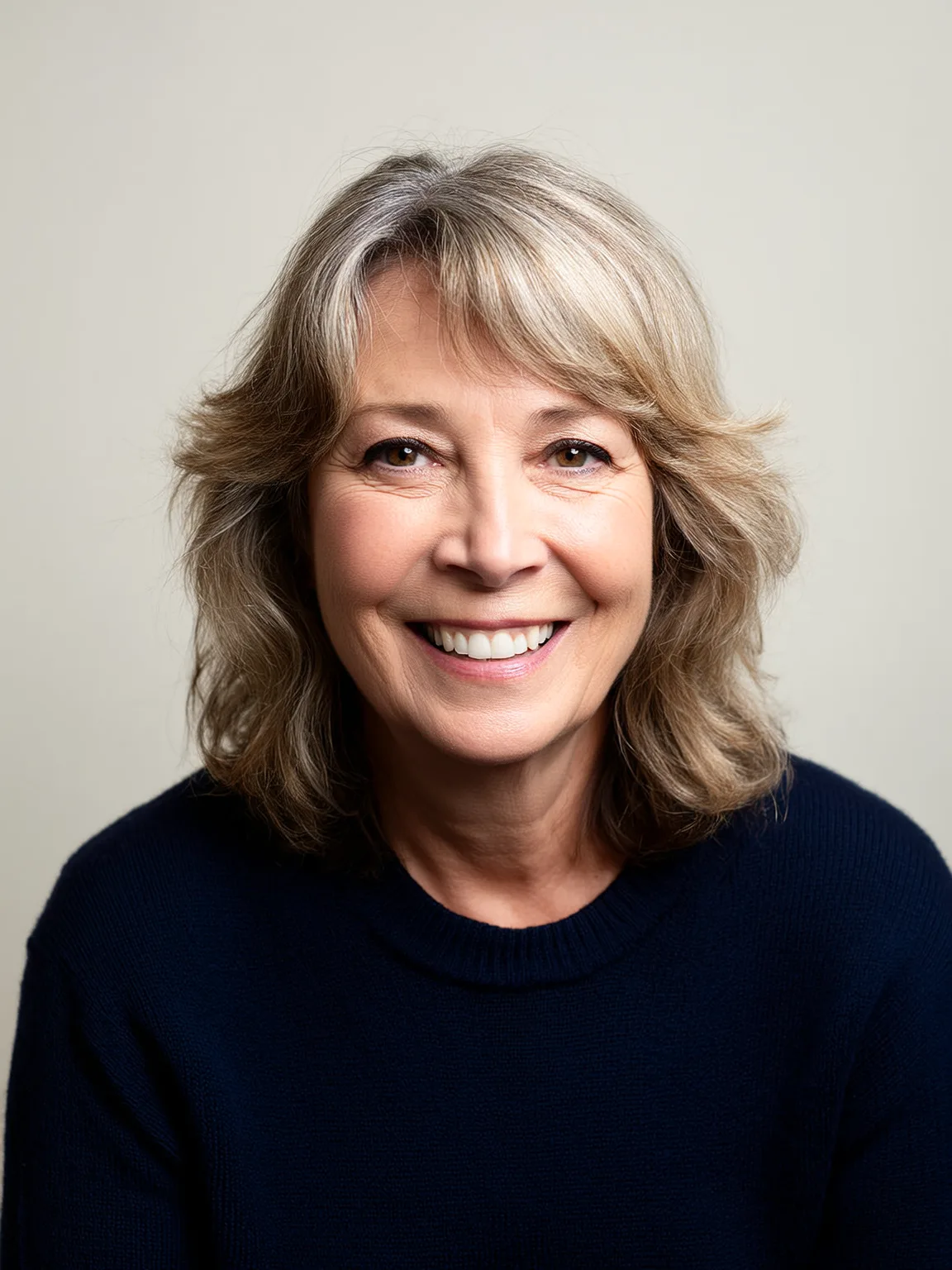 Ashy Silver Layered Bob with Blonde Highlights